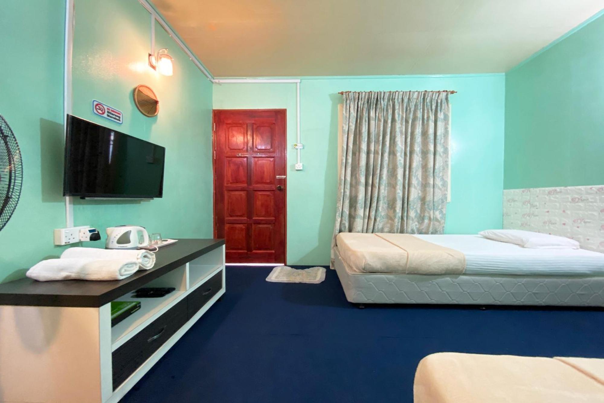 Oyo Home 90285 Pogimpaan Homestay Ранау Екстериор снимка